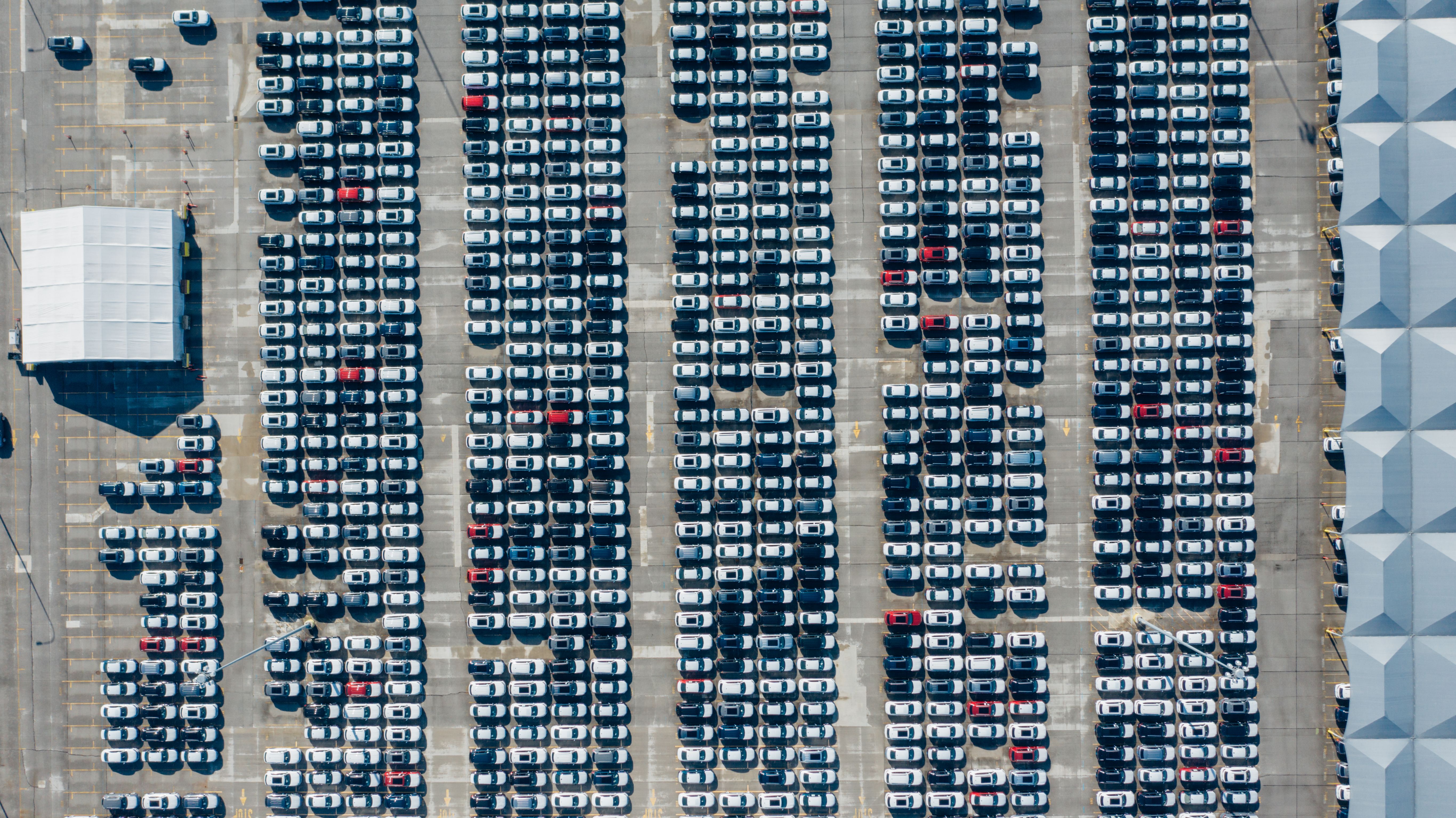 various modern vehicles parked in a row - budget direct car quote various modern vehicles parked in a row - budget direct car quote