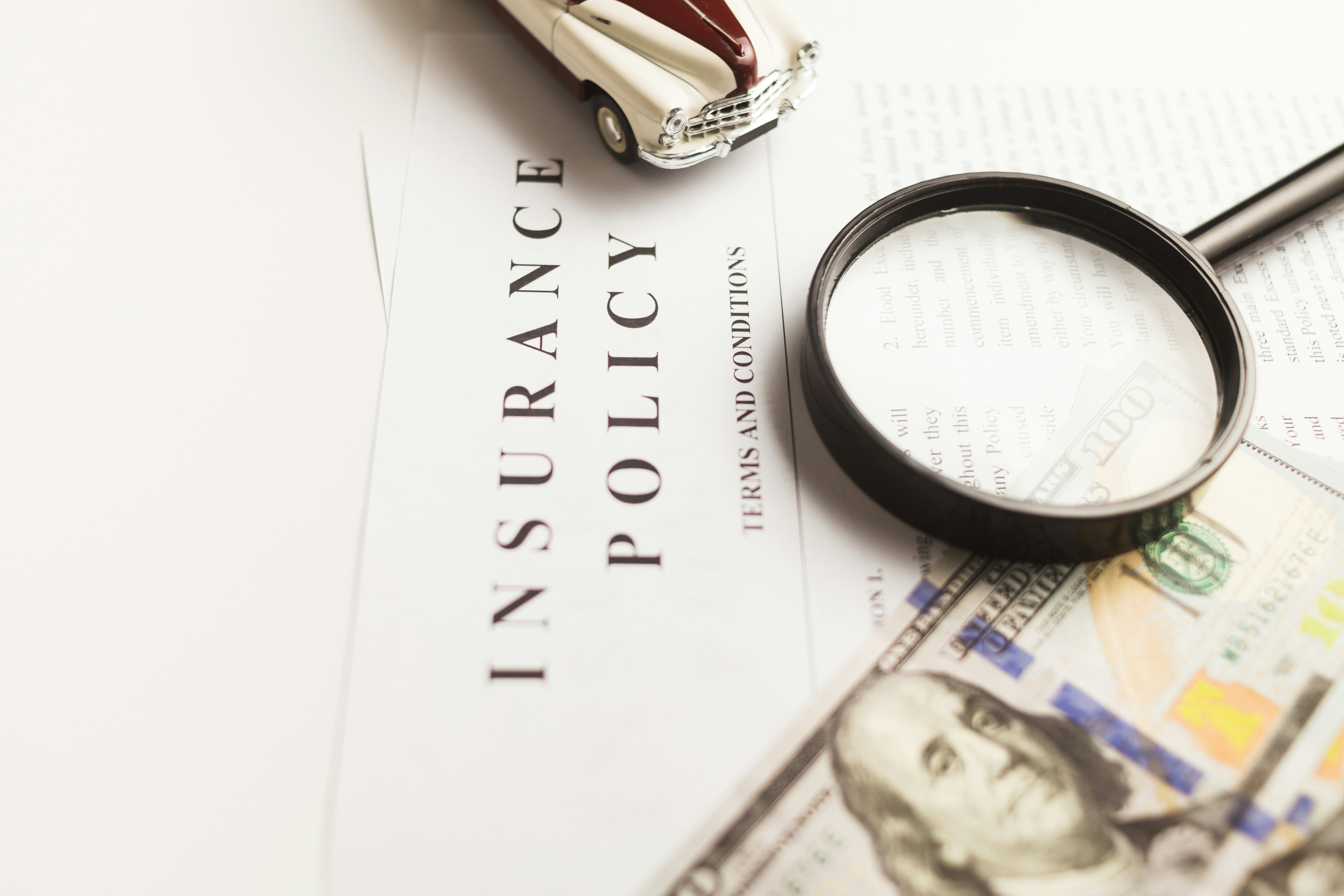 Official insurance appraisal document with a magnifying glass - scheduled personal property