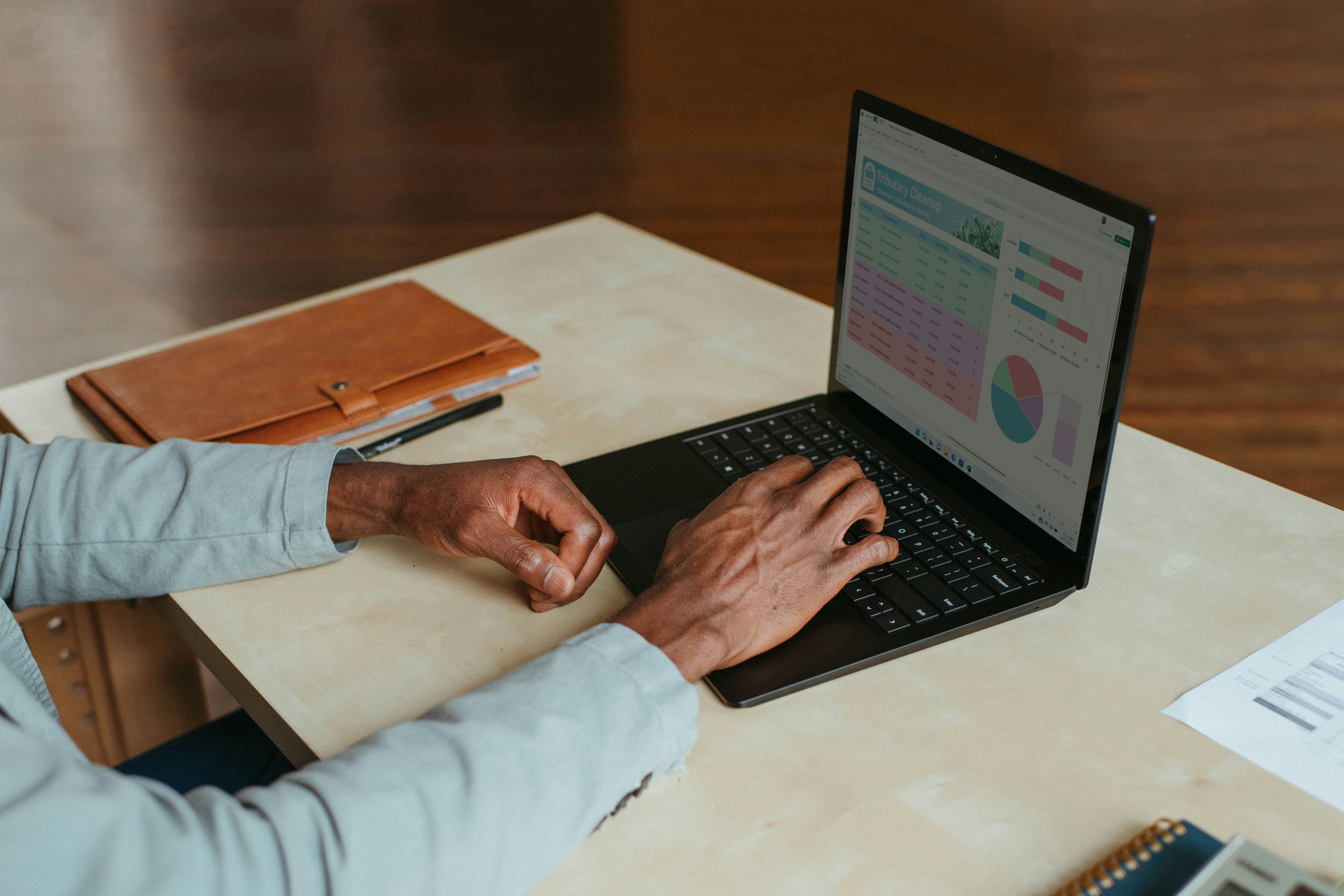 Person using a laptop to calculate financial projections - buy term and invest the difference calculator