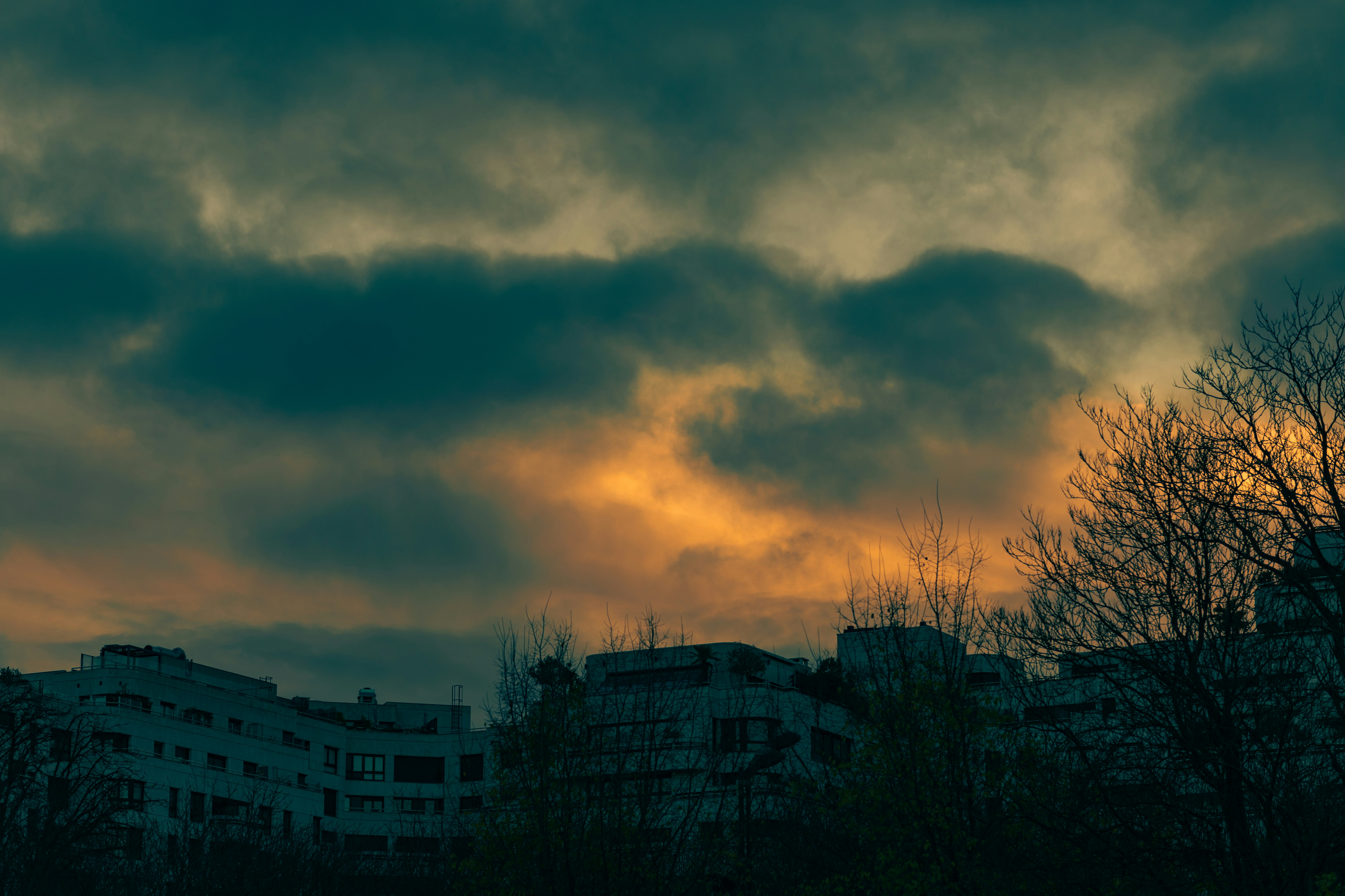 Storm clouds over a residential area - Home insurance deductible