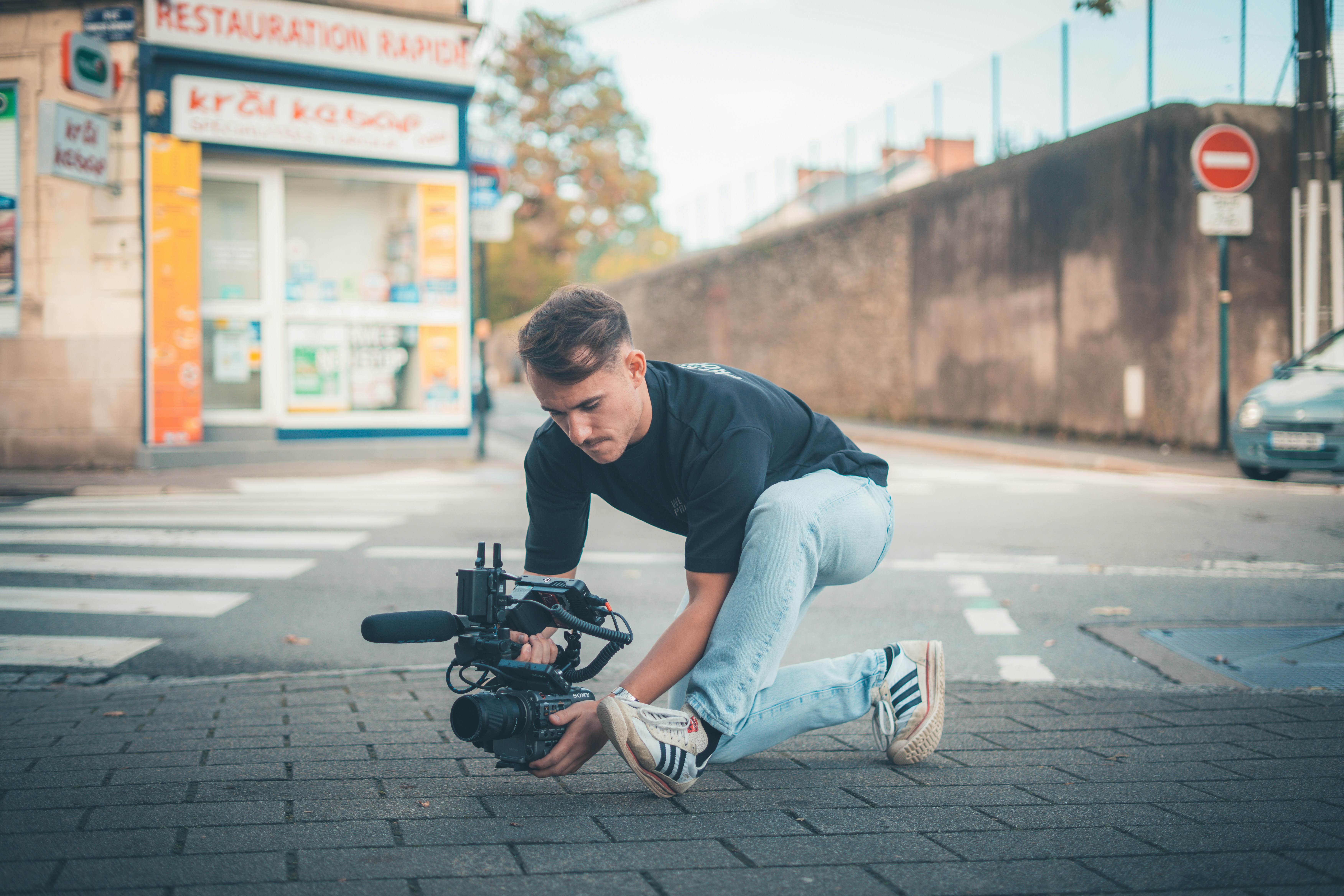 photographer on location with expensive camera gear and lighting - business equipment insurance photographer on location with expensive camera gear and lighting - business equipment insurance
